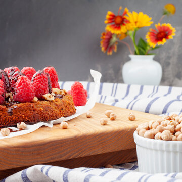 Chickpea Pie Blondie Is A Healthy Dessert Made From Chickpeas That Does Not Contain Flour, Sugar Or Eggs. Vegan Dessert. Garnished With Fresh Raspberries