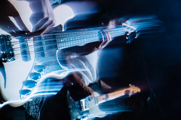 Bass player playing on stage