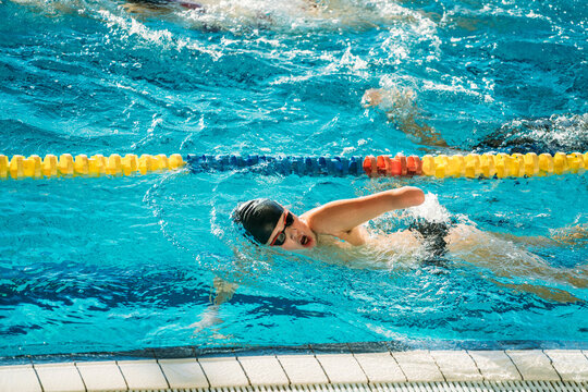 Paralympic swimmer training in pool