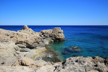 Fototapeta na wymiar Rocky sea coast. A bay on the Mediterranean coast.