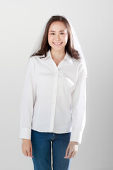 Portrait of young attractive Asian woman wearing white shirt and veil smiling at camera against white background. Concept for pre wedding photography. Isolated