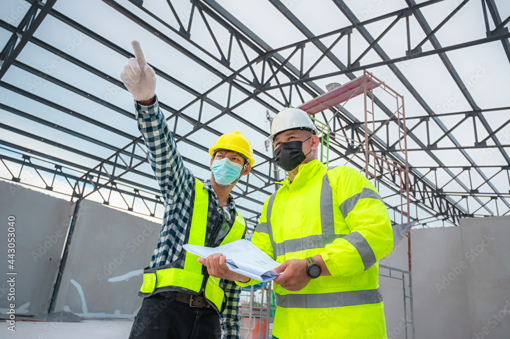 Wall mural civil engineer inspect structure at construction site against blueprint, building inspectors jointly