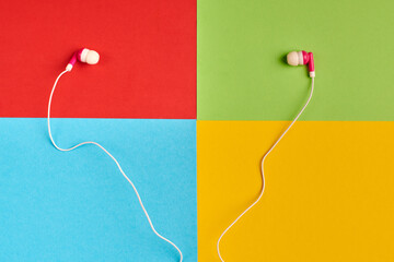 Red, green, blue, yellow paper colours. Audio software concept