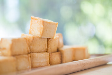 Close up of a pile diced fish tofu