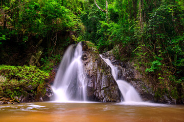 Fototapeta na wymiar Leva or Rak Jung Na mon Waterfall at Ban Na mon in Wiang Haeng District, Chiang Mai, Thailand.