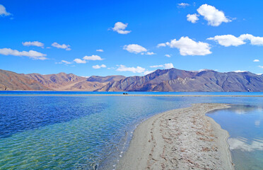 Landscape Nature Scene of Pangong tso or Pangong blue Lake with Himalaya Snow mountain background at Leh Ladakh ,Jammu and Kashmir , India  - unseen travel vacation park and outdoor - obrazy, fototapety, plakaty