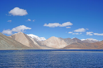 Landscape Nature Scene of Pangong tso or Pangong blue Lake with Himalaya Snow mountain background at Leh Ladakh ,Jammu and Kashmir , India  - unseen travel vacation park and outdoor