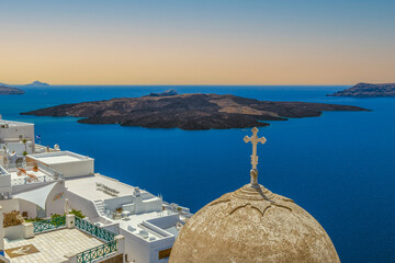 Architecture with domes, churches and hotels of Fira, Santorini island, Greece