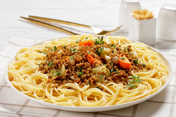tasty pasta topped with ground beef ragout stew