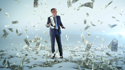 Cheerful businessman dancing under money rain