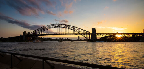 Silhouette scene  at the Sydney. Panoramic image of Sydney, Australia with Harbour Bridge during ...