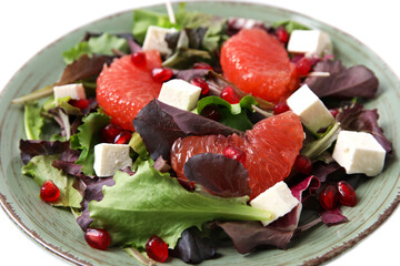 Plate with tasty grapefruit salad on white background, closeup