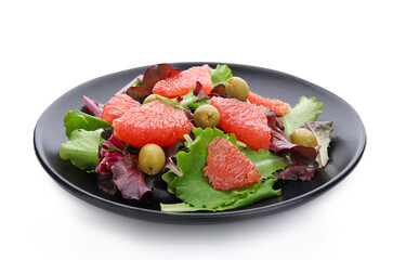 Plate with tasty grapefruit salad on white background