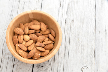 Almonds on the wooden table