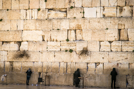 People praying in the Western Wall in the old city Jerusalem, Israel Western Wall. Prayers at the Wailing Wall in Jerusalem.