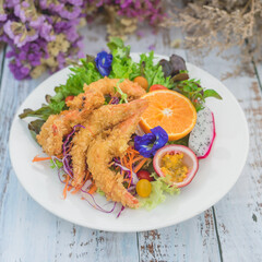 fried shrimps with salad