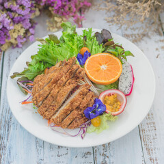 grilled pork with salad