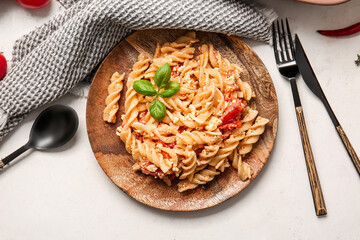 Plate with healthy pasta on table