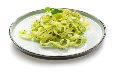Plate with tasty pesto pasta on white background
