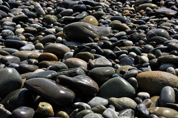 Sea pebbles close-up. Background image.