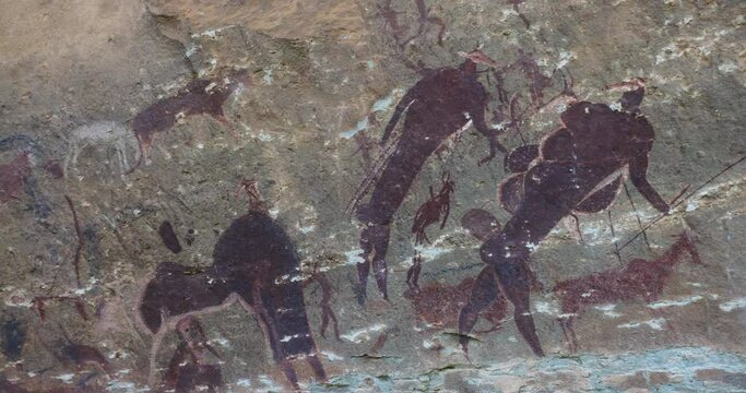 Panning view of well preserved San bushman paintings in the Main caves at Giants Castle,Drakensberg, KwaZulu-Natal,South Africa