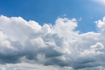 Fototapeta na wymiar Blue sky white cloud fluffy gray clouds.dramatic blue sky,clouds warm summer day background.