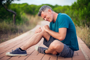 Knee pain. Man with leg injury. Healthcare and medicine concept