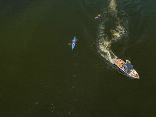 Fototapeta premium Kayak on the river in summer. Aerial drone view.