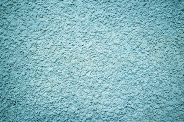 Blue messy wall stucco texture background. Decorative wall paint.