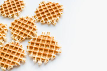 Confectionery products. Waffles on a white background. Soft waffles on a white background.