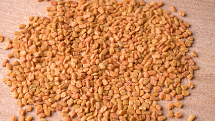 Organic fenugreek seeds, ingredient in Indian cuisine.