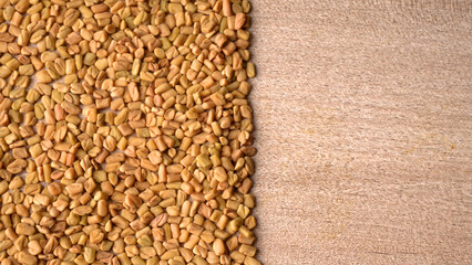 Organic fenugreek seeds, ingredient in Indian cuisine.