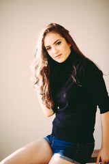 portrait of a woman posing in studio
