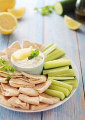 Tzatziki, Greek dip sauce with pita and cucumbers