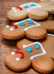 ginger bread men cookies on rustic table