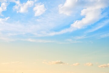 blue sky with white clouds on natural light background. vintage style photo