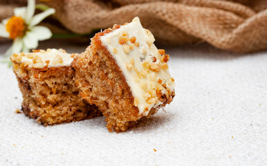 carrot cake squares on rustic farm table