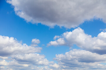 Fototapeta na wymiar White clouds against blue sky