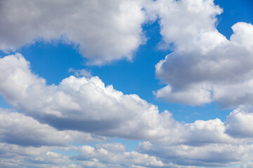White clouds against blue sky