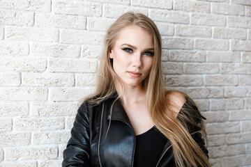 beautiful sexy girl in black leather jacket