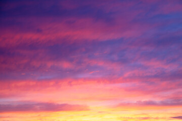 Fototapeta premium Colorful sunset with clouds in the sky.