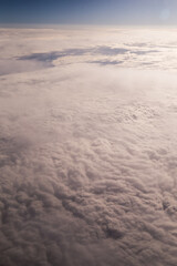 Fototapeta na wymiar Textured clouds view from a plane