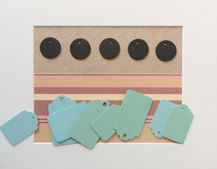 blue green and round black retro wooden tags on a craft and striped paper background with accent frame