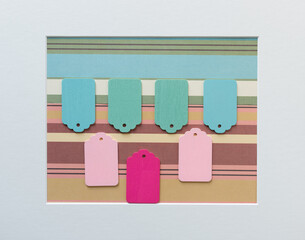 retro wooden tags on striped paper background with accent frame
