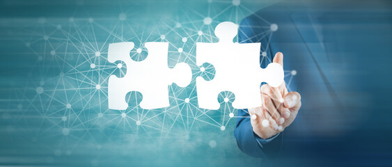 businessman and puzzle on screen