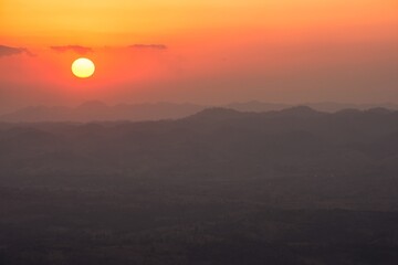 The sunrise and mountain view.Taken in warm filter and soft focus effect.