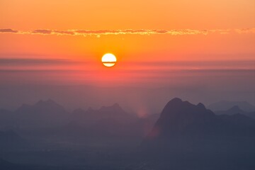 The sunrise and mountain view.Taken in warm filter and soft focus effect.