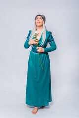 Full length portrait of a princess in a medieval, fantasy, turquoise dress with ash hair and a silver crown, posing with white roses in hands, isolated on a white background.