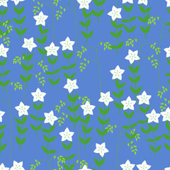Seamless pattern of a glade of white flowers on a blue background.