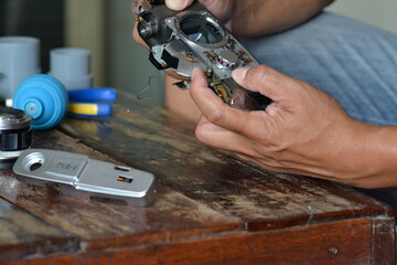 Film cameras cleaned by technicians.